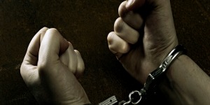 Male hands in handcuffs Jail Bond