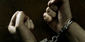 Male hands in handcuffs Jail Bond Types